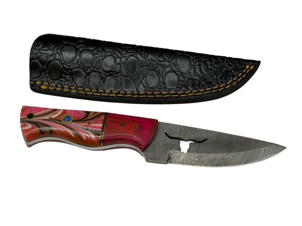 DAMASCUS STEEL FIXED BLADE KNIFE FEATURING LONG HORN SILHOUETTE CUTOUT IN BLADE: ALSO FEATURES A DYED RED WOOD AND EPOXY RESIN HANDLE WITH FULL TANG BLADE AND INCLUDES A LEATHER SHEATH 4" BLADE, 7 3/4" TOTAL LENGTH