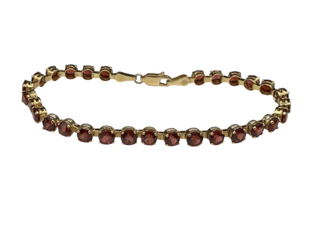14K YELLOW GOLD DESIGNER HALLMARKED ROUND CUT GARNET TENNIS BRACELET: IMPERIAL GOLD COMPANY, FEATURES 30 ROUND CUT GARNETS 7 1/4" X 3/16", 6.35 GRAMS, 4MM GARNETS