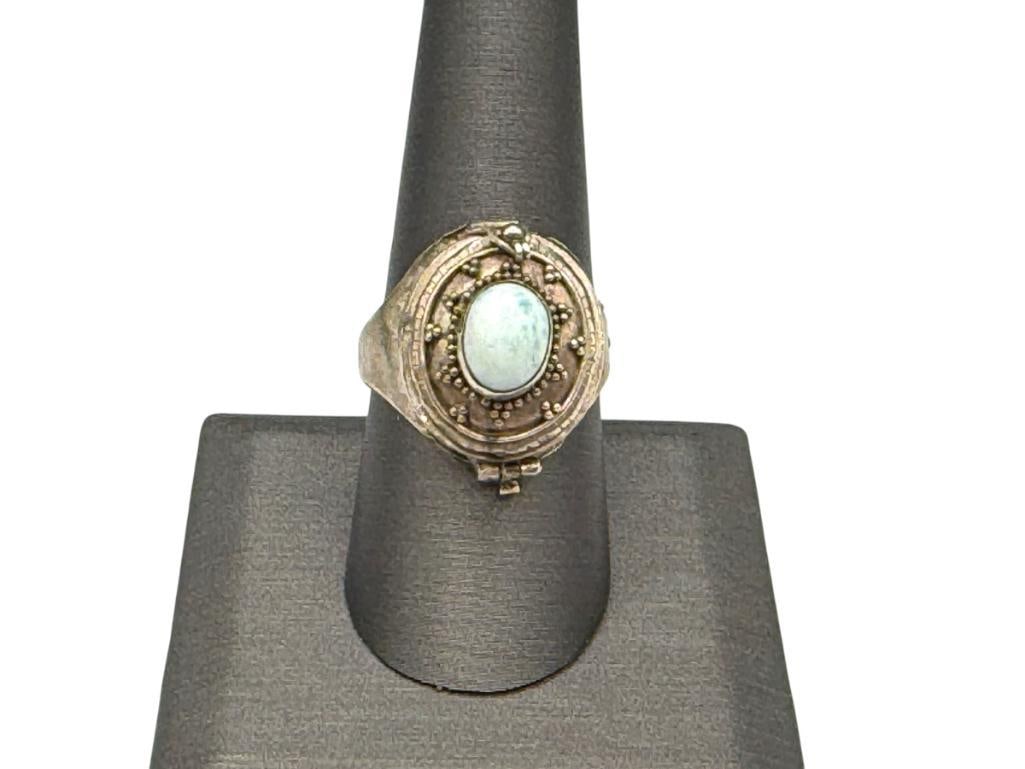 STERLING SILVER POISON RING WITH CABOCHON STONE: HINGE ON POISON LID IS DAMAGED SIZE 9 1/4, 7/8" FRONT, 6.27 GRAMS