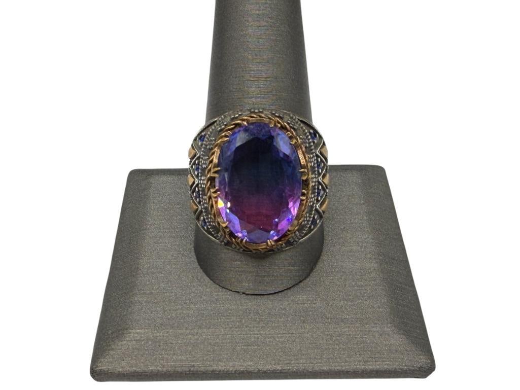 STERLING SILVER PURPLE AND BLUE GLASS GEM RING WITH BRASS AND ROUND BLUE STONE ACCENTS: SIZE 12, 1" FRONT, 11.24 GRAMS