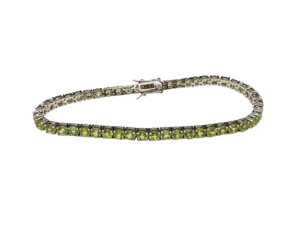 STERLING SILVER ROUND CUT PERIDOT TENNIS BRACELET: 8 1/4" X 3/16", 4MM PERIDOTS, 14.89 GRAMS
