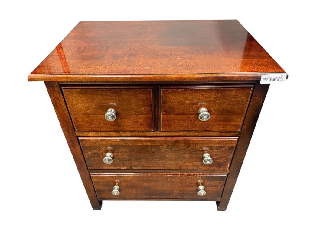 RICH GRAIN DARK FINISH WOOD NIGHTSTAND WITH THREE DRAWERS AND NICKEL FINISH HARDWARE: OVERALL IN GOOD CONDITION, LIGHT SCRATCHES TO FINISH ON TOP 28" X 20" X 30"