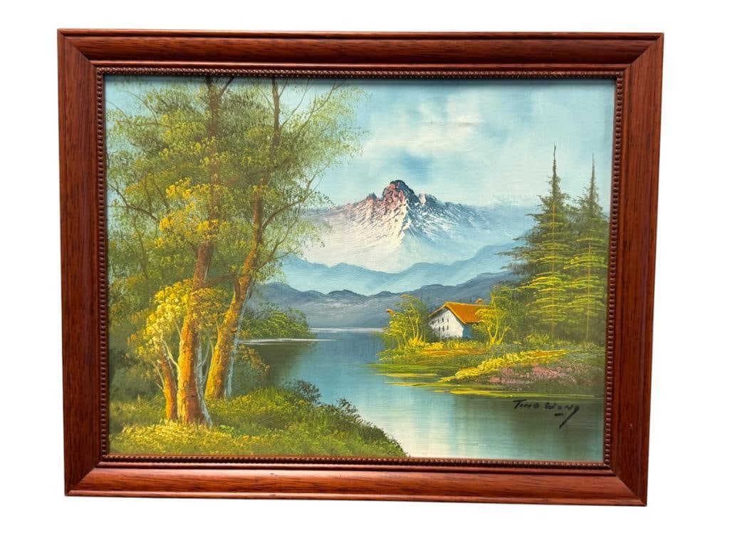 TINO WONG ORIGINAL OIL ON CANVAS LANDSCAPE PAINTING: ART DEPICTS EUROPEAN HOME NEAR A BODY OF WATER SURROUNDED BY TREES WITH MOUNTAINS IN THE BACKGROUND, SINGED LOWER RIGHT, FRAMED 18 1/2" X 14 3/4" FRAME
