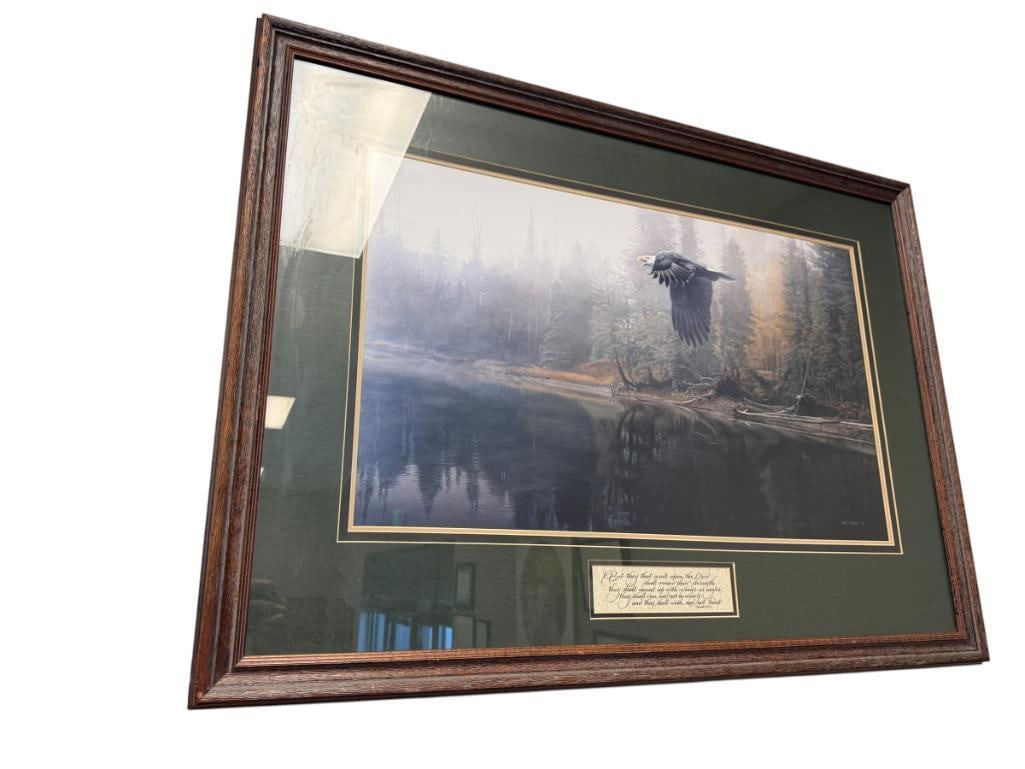T. ISSACC BALD EAGLE PRINT WITH RELIGIOUS PROVERB: ART ILLUSTRATED EAGLE FLYING ABOVE WATER WITH FOREST BACKGROUND, WITH PROVERB BELLOW ISAIAH 40:31, PLATE SIGNED LOWER RIGHT, FRAMED 41" X 30"