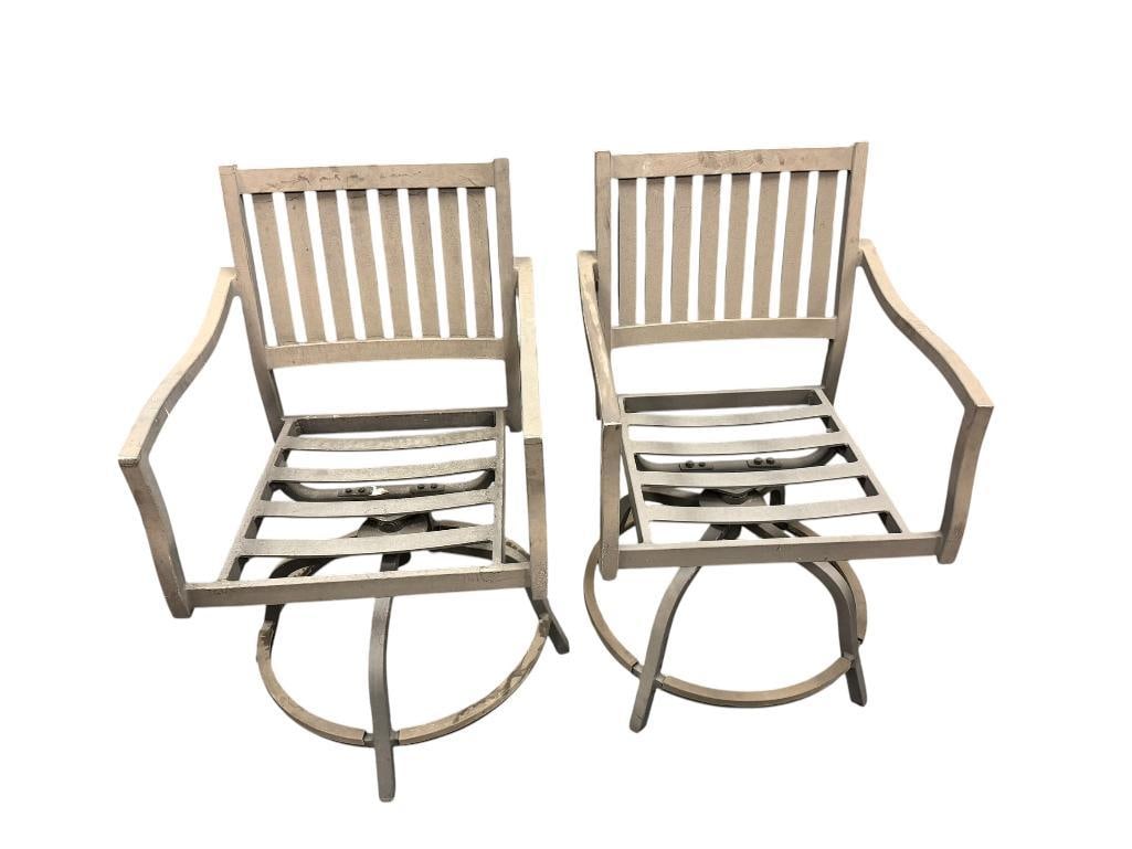 PAIR OF ALUMINUM OUTDOOR / PATIO SWIVEL ARM CHAIRS: BOTH ARE WEATHERED 