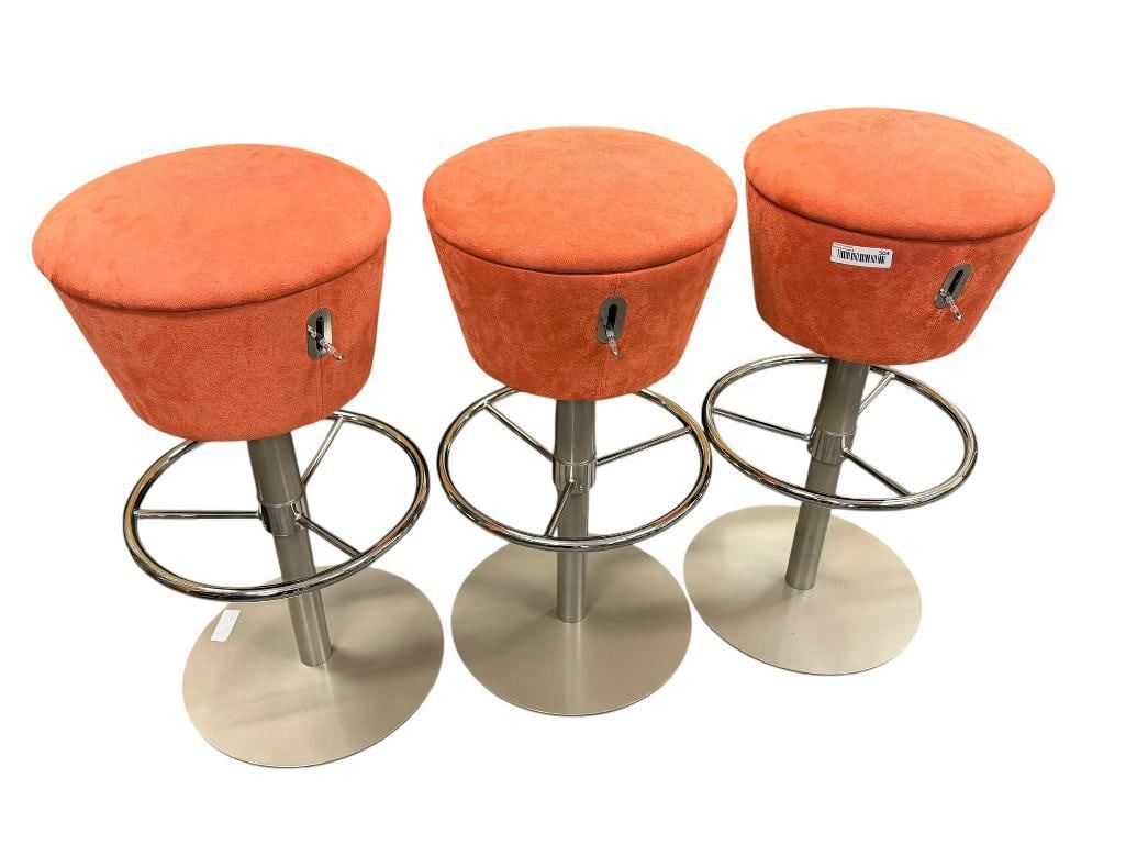 SET OF THREE CONTEMPORARY MODERN ADJUSTABLE BAR STOOLS WITH ROUND BASE: ORANGE UPHOLSTERY WITH CHROME FOOT REST AND ADJUSTABLE LEVER 27" - 30" H