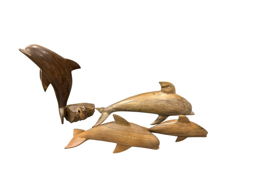 VINTAGE IRON WOOD DOLPHIN SCULPTURES: ONE DOLPHIN FIGURE HAS ATTACHED NATURAL BASE, ONE DOLPHIN HAS DAMAGED TIP ON ONE OF ITS FINS, ALL HAVE SUN DAMAGE 7 1/2" UP TO 12 1/2" L