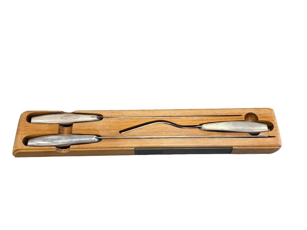 VINTAGE CASE XX THREE PIECE CARVING / CUTLERY SET: INCLUDES FORK KNIVES CA245 AND CA243, INCLUDES WOOD BLOCK WITH BUILT-IN SHARPENING STONE 10 1/2" AND 12 1/4" BLADES