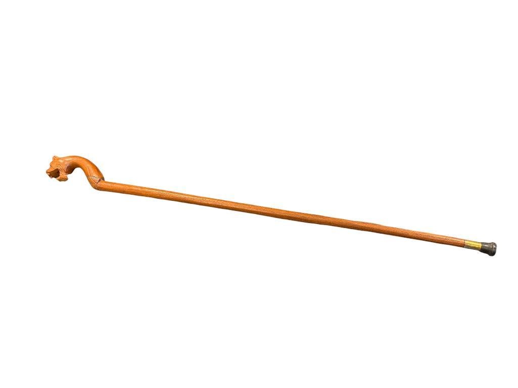 VINTAGE HAND CARVED WOODEN CANE WITH LEOPARD HEAD CARVED HANDLE: HAS BEEN PREVIOUSLY REPAIRED 40" L
