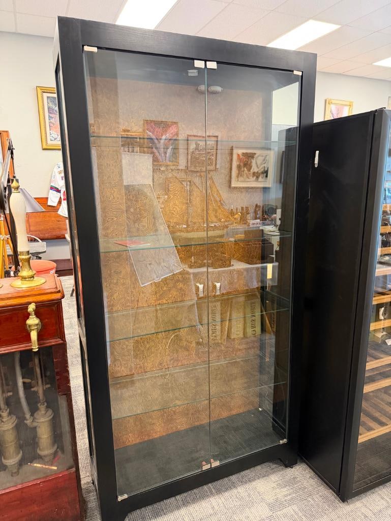 HOWARD MILLER ILLUMINATING DISPLAY CABINET WITH GLASS FRONT DOORS AND WOOD GRAIN BACK MODEL. 680-... - 3
