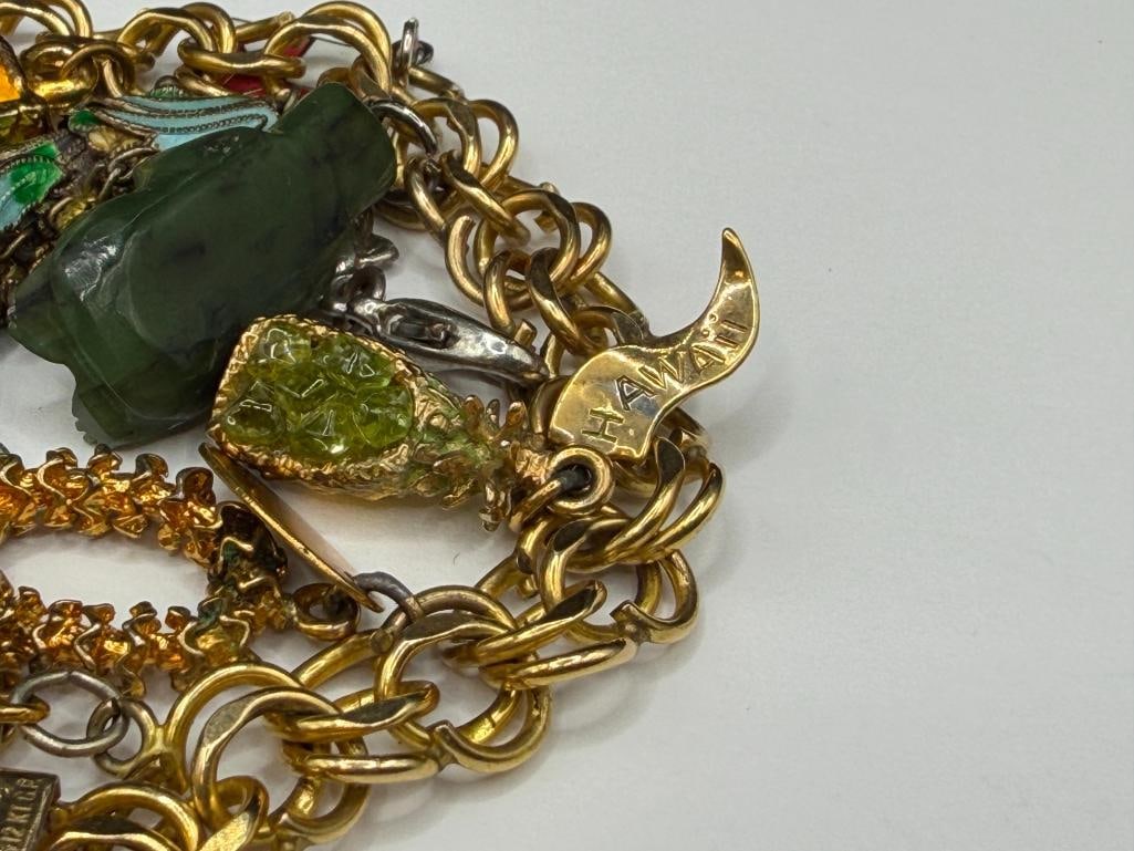 VINTAGE GOLD FILLED CHARM BRACELET FILLED WITH SEVERAL STERLING SILVER CHARMS AND TRAVELER THEME - 11