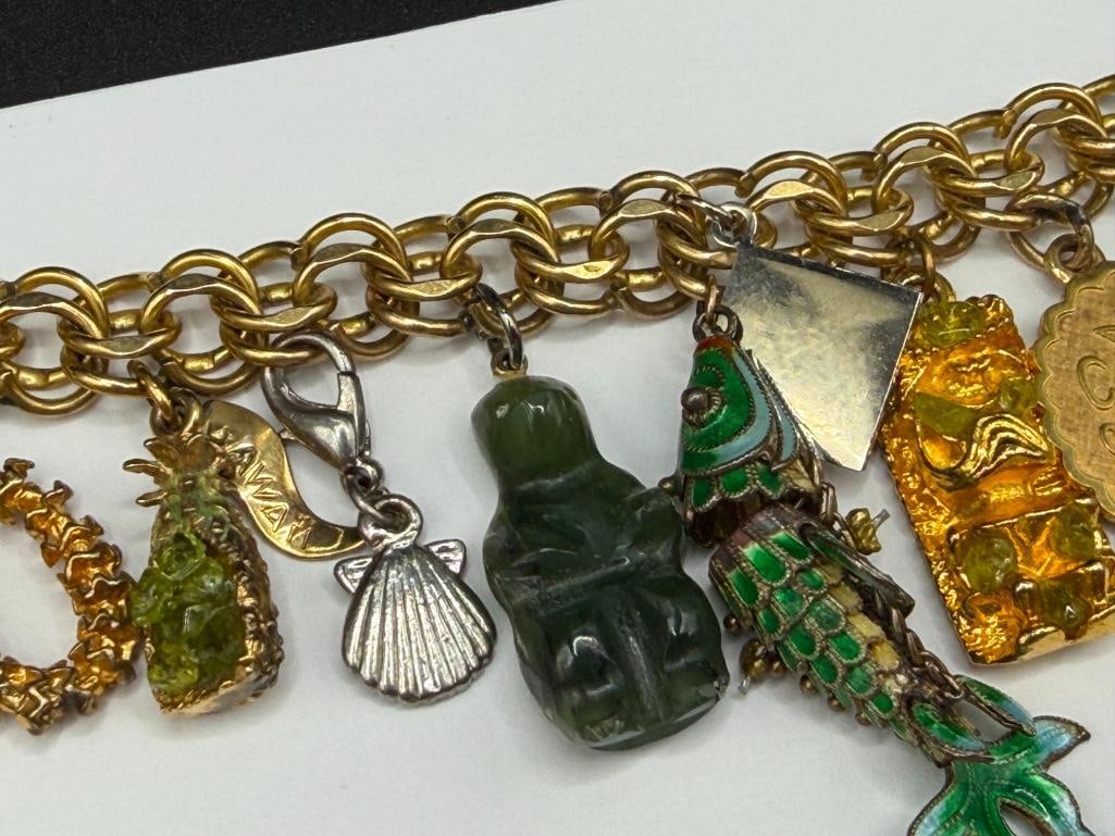 VINTAGE GOLD FILLED CHARM BRACELET FILLED WITH SEVERAL STERLING SILVER CHARMS AND TRAVELER THEME - 4
