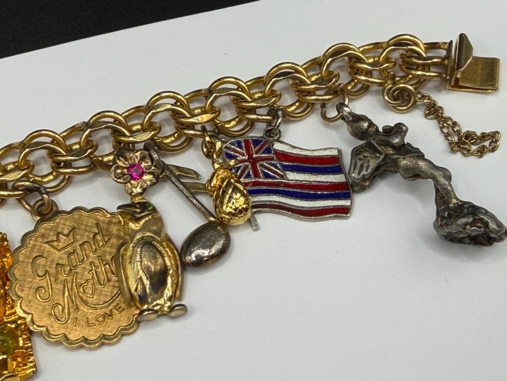 VINTAGE GOLD FILLED CHARM BRACELET FILLED WITH SEVERAL STERLING SILVER CHARMS AND TRAVELER THEME - 5
