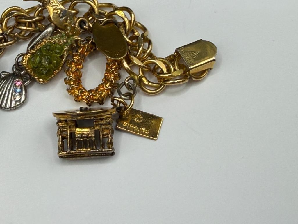 VINTAGE GOLD FILLED CHARM BRACELET FILLED WITH SEVERAL STERLING SILVER CHARMS AND TRAVELER THEME - 9