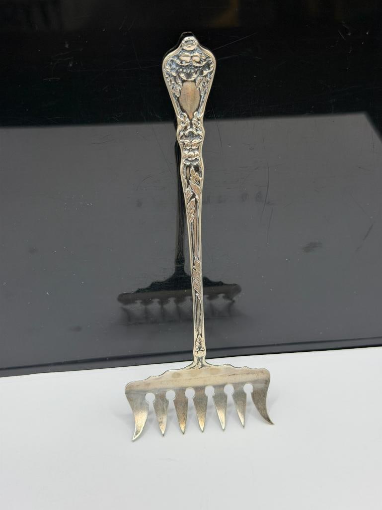 ANTIQUE MACHESTER MANUFACTURING STERLING SILVER SARDINE FORK: MARKED WITH "M" IN SHIELD BETWEEN TWO DOVES, ART NOUVEAU PATTERN 5 1/2", 14.85 GRAMS