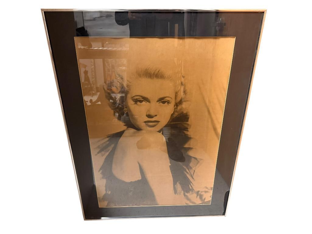 MARILYN MONROE SEPIA TONED PHOTOGRAPHED PRINT FROM MGM GRAND HALL OF CELEBRITIES: FRAMED WITH CLASS, GLASS HAS BROKE IN BOTTOM RIGHT CORNER, NO PROVENANCE OTHER THAN CONSIGNOR STATEMENT 30" X 40" FRAME