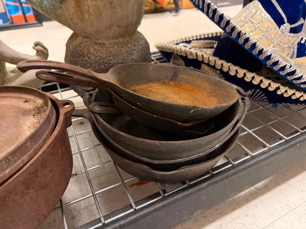 SEVEN ASSORTED CAST IRON COOKWARE PIECES INCLUDING SKILLETS AND LODGE #12 DUTCH OVEN - 6