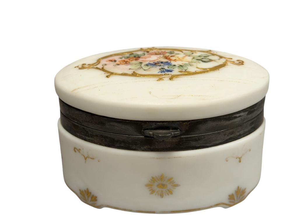 THE PAIRPOINT CORP. HAND PAINTED OPAL GLASS HINGED TRINKET / DRESSER BOX: HAND PAINTED AND GILT FLORAL DESIGN, SILVER RIM WITH HINGE, MARKED ON THE BOTTOM, NO CHIPS OR CRACKS 5" L