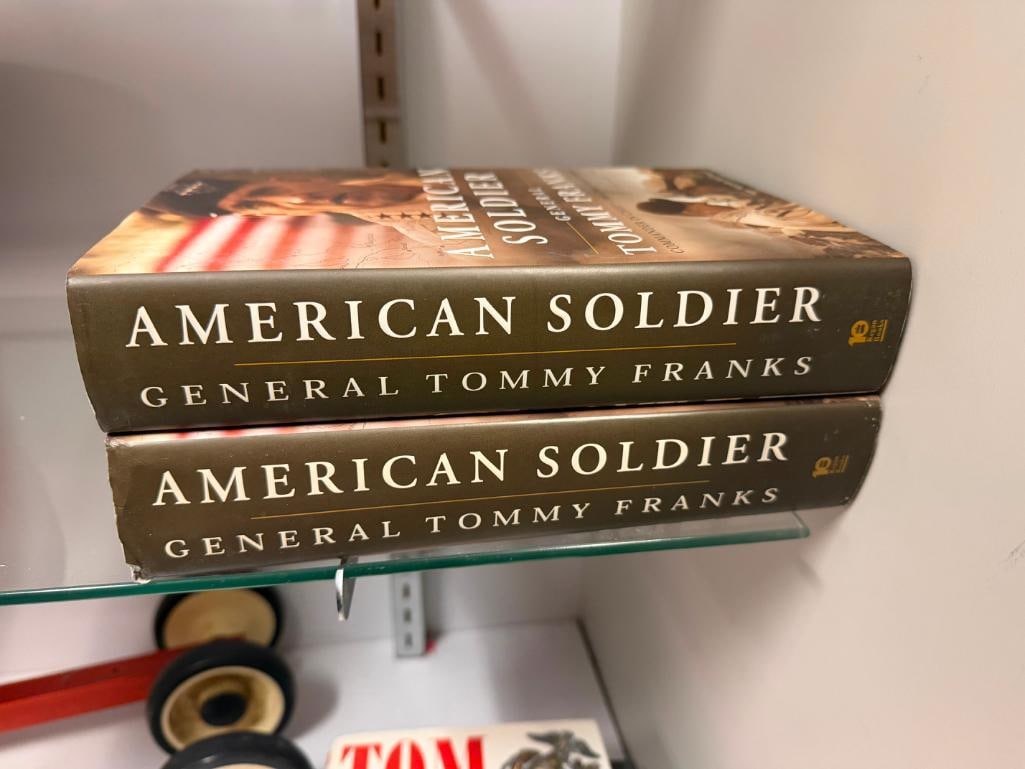 FIVE SIGNED HARDBACK BOOKS FROM AUTHORS TOM CLANCY, TOMMY FRANKS, STEPHEN RODRICK, AND MORE - 12