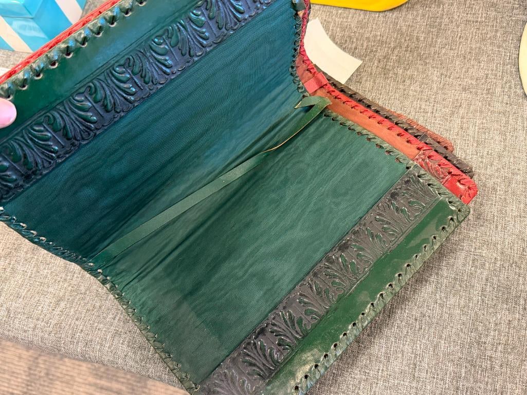 FOUR HAND CRAFTED LEATHER BOOK COVERS / DUST JACKETS WITH DIFFERENT DESIGNS - 10