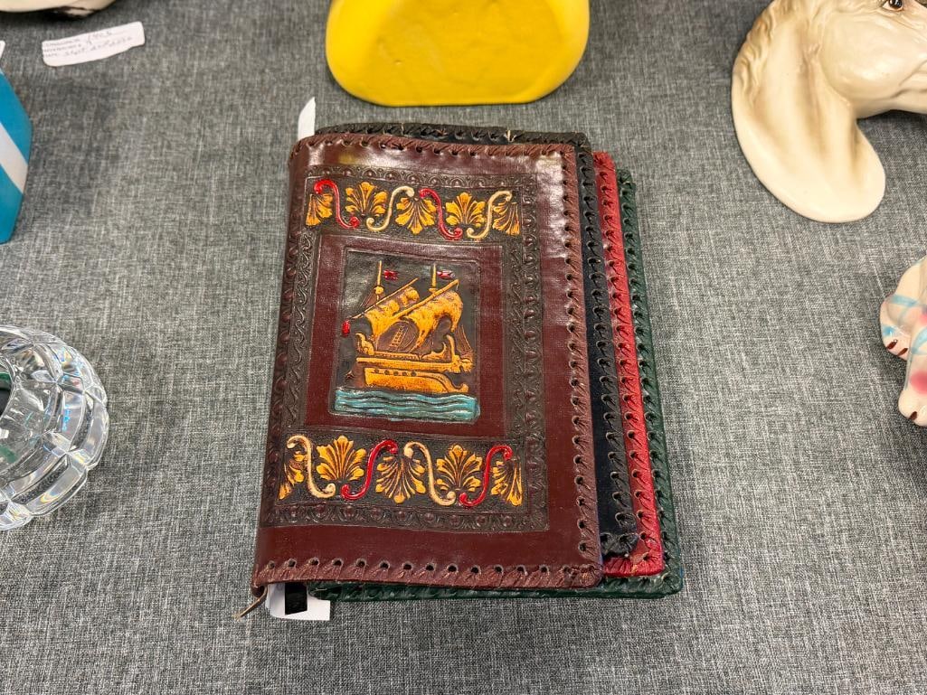 FOUR HAND CRAFTED LEATHER BOOK COVERS / DUST JACKETS WITH DIFFERENT DESIGNS - 2