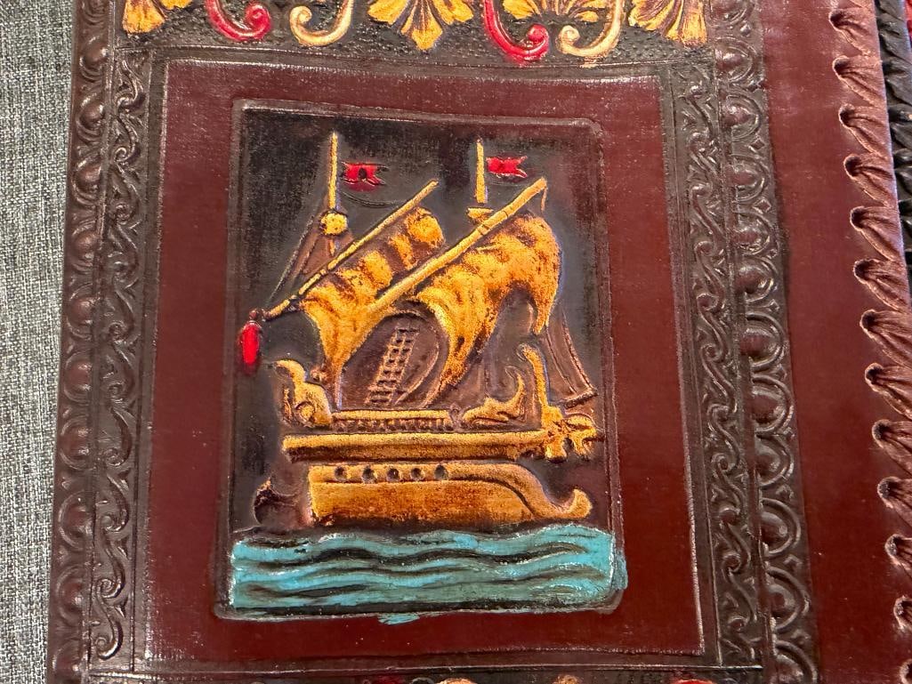 FOUR HAND CRAFTED LEATHER BOOK COVERS / DUST JACKETS WITH DIFFERENT DESIGNS - 4