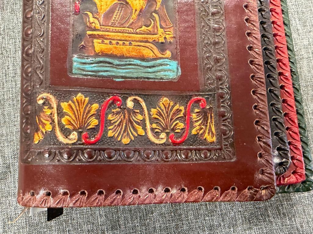 FOUR HAND CRAFTED LEATHER BOOK COVERS / DUST JACKETS WITH DIFFERENT DESIGNS - 6
