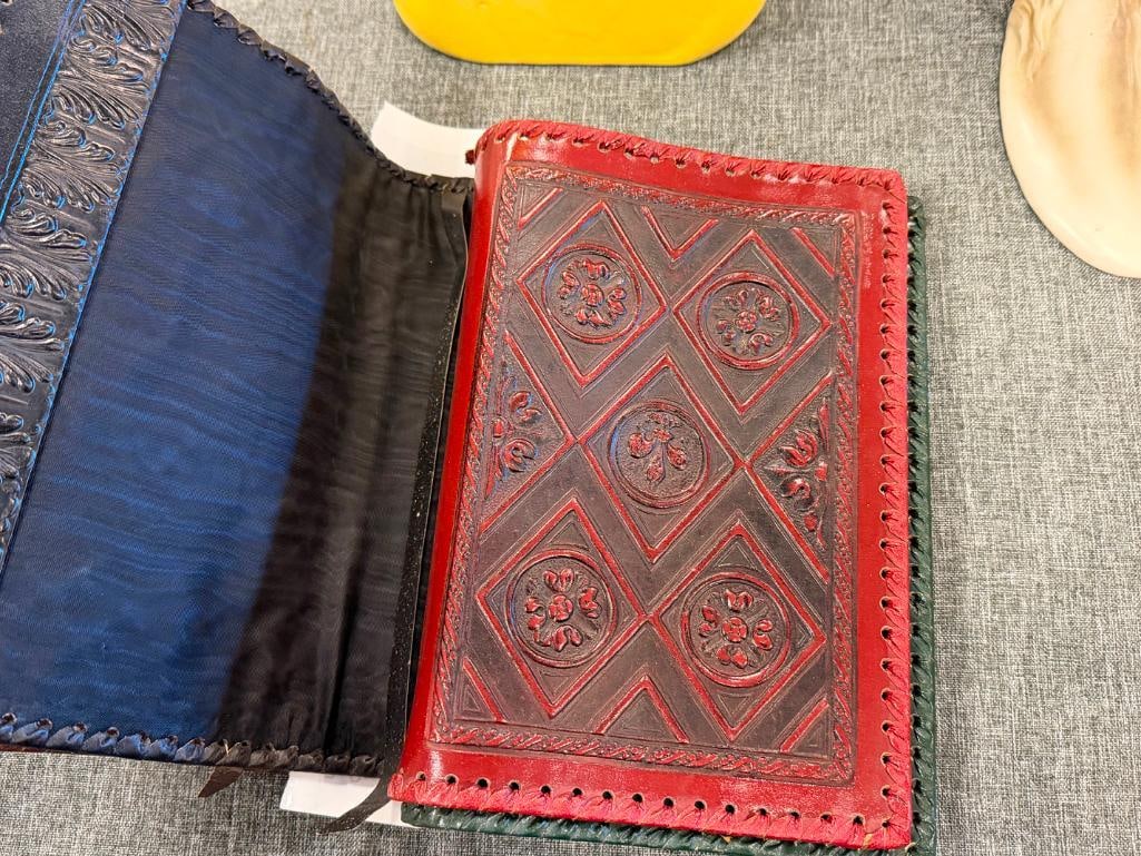 FOUR HAND CRAFTED LEATHER BOOK COVERS / DUST JACKETS WITH DIFFERENT DESIGNS - 8