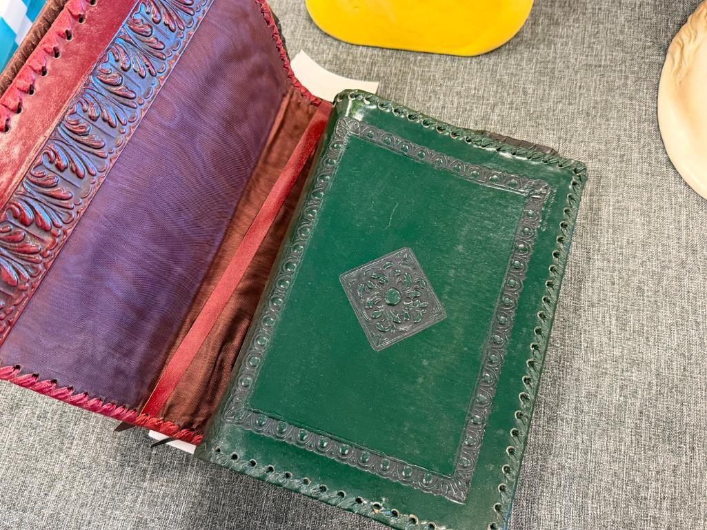 FOUR HAND CRAFTED LEATHER BOOK COVERS / DUST JACKETS WITH DIFFERENT DESIGNS - 9