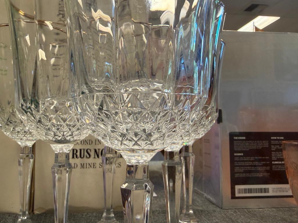 SIX GOLD-RIMMED GLASS WINE GLASSES - 7