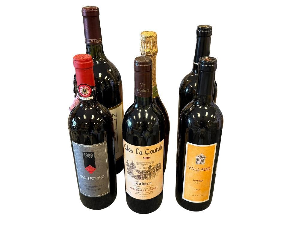 SIX SEALED BOTTLES OF WINE CAB, CAHORS TABLE WINE, ZINFANDEL, CHAMPAGNE: 1989 SAN LEONINO, 1990 B.R. COHN, KORBEL CHARDONNAY CHAMPAGNE, 2000 CLOS LA COUTALE, 1999 KARLY, 2007 VALLADO, EACH BOTTLES IS SEALED, WERE STORED PROPERLY, MUST BE 21+ TO BID AND PURCHASE ITEM, 