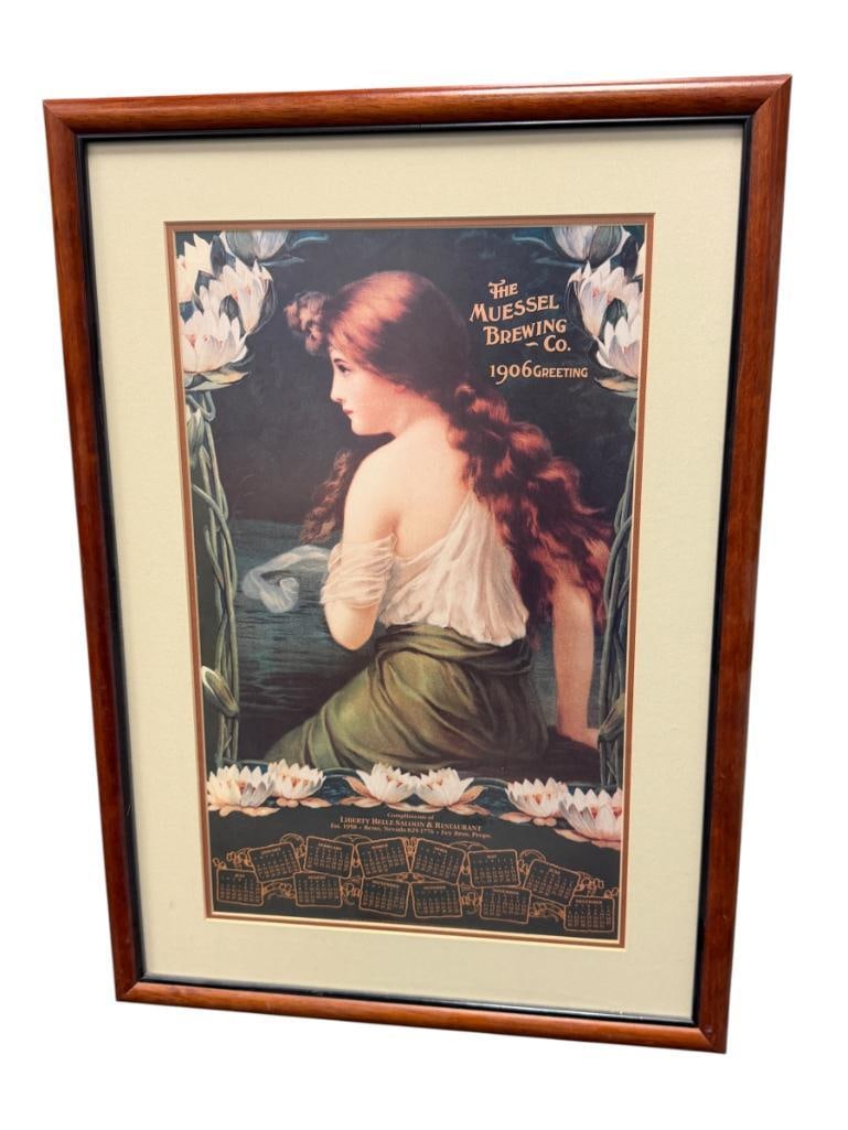 REPRODUCTION THE MUESSEL BREWING CO. ILLUSTRATED CALENDAR: ART WITH SEATED WOMAN WITH FLORAL BORDER, FRAMED 17" X 24" FRAME