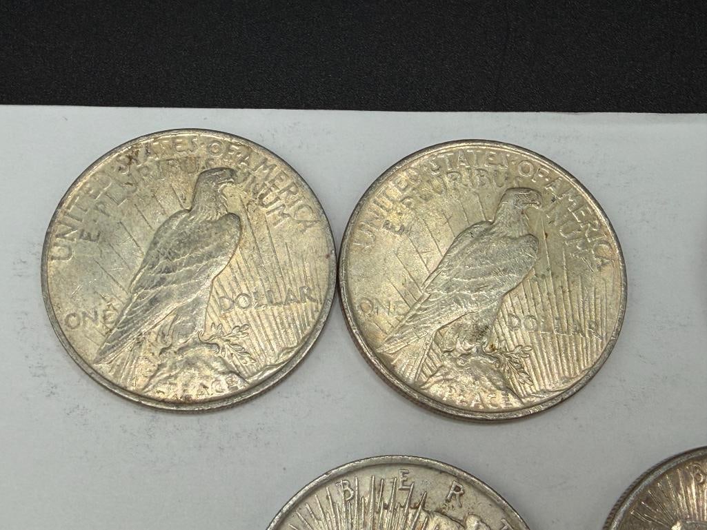 FIVE ASSORTED U.S. PEACE SILVER DOLLARS FEATURING VARIOUS DATES AND MINT MARKS - 3