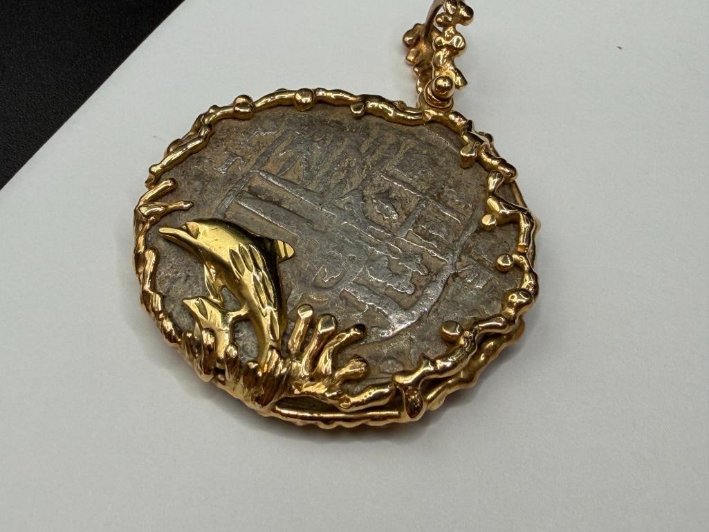 14K YELLOW GOLD DOLPHIN MOTIF PENDANT FEATURING CABOCHON EMERALD AND SILVER 8 REALES ATOCHA COIN - 8