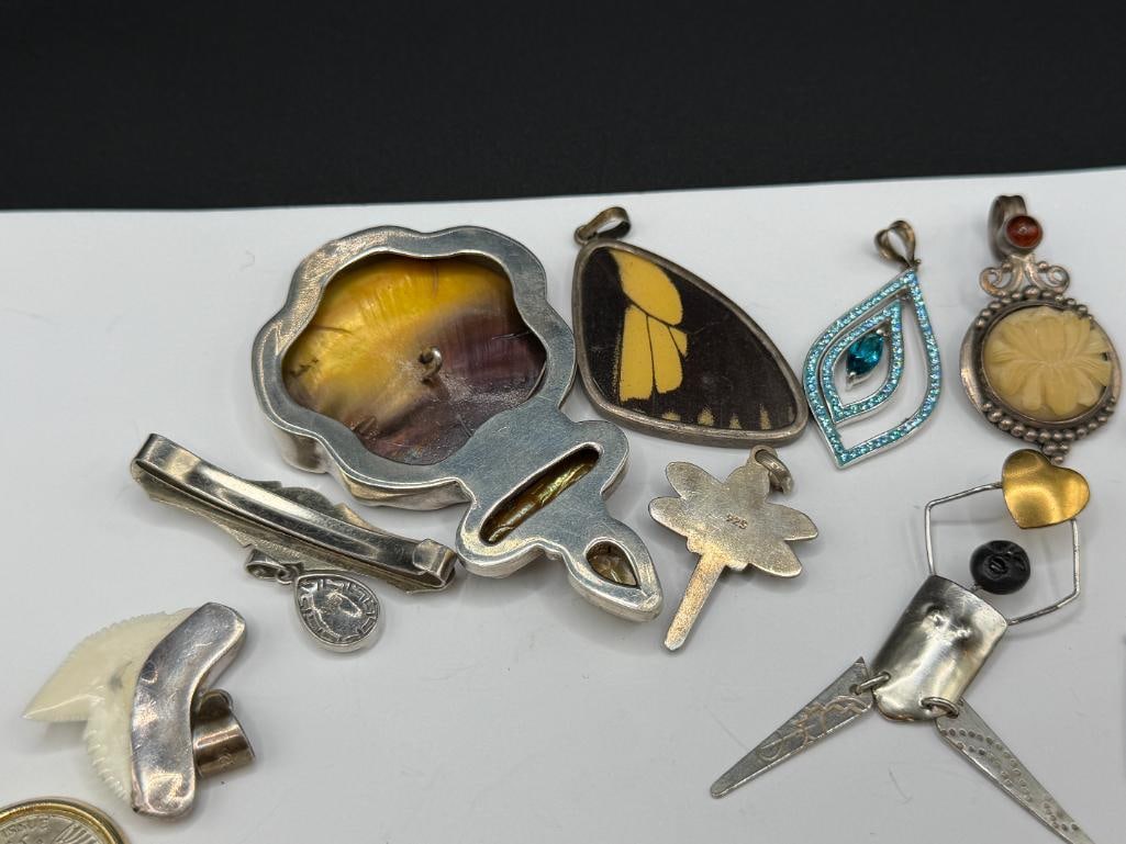 ASSORTED JEWELRY FEATURING MOSTLY STERLING SILVER PENDANTS - 10
