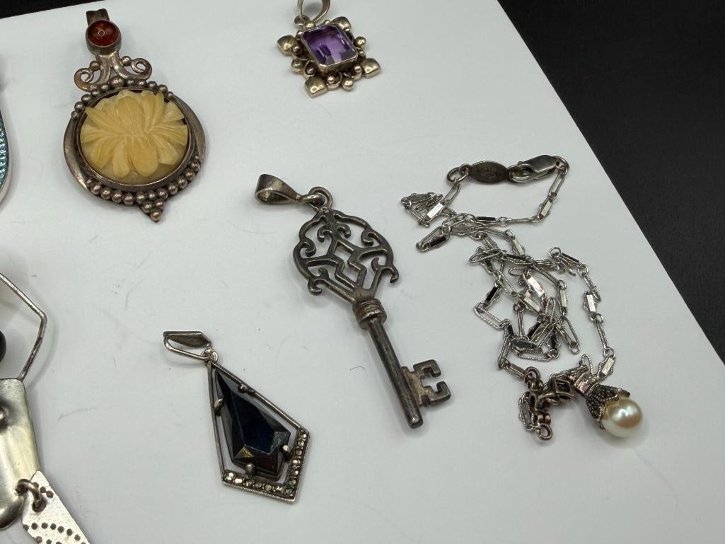 ASSORTED JEWELRY FEATURING MOSTLY STERLING SILVER PENDANTS - 6