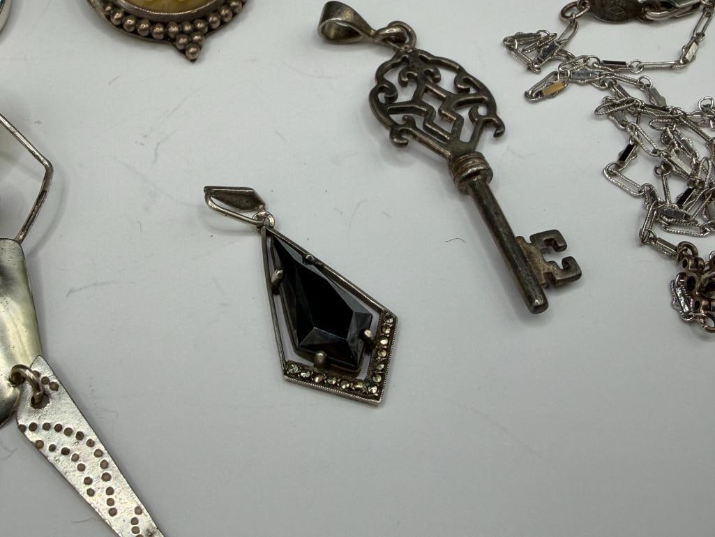 ASSORTED JEWELRY FEATURING MOSTLY STERLING SILVER PENDANTS - 7
