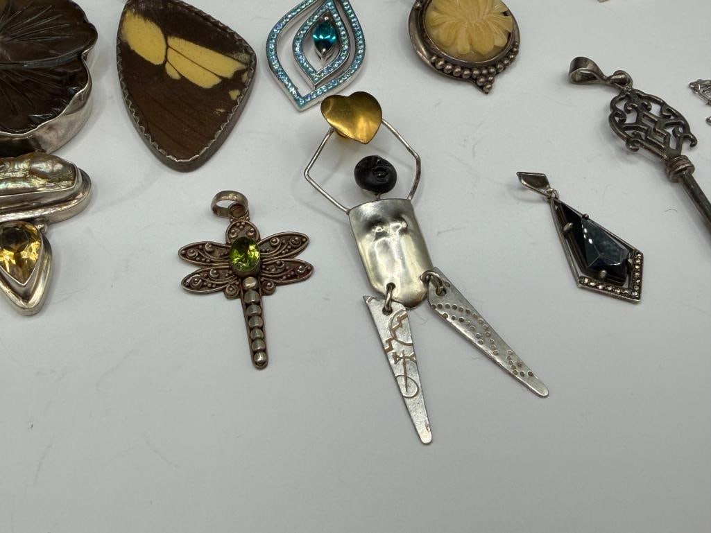 ASSORTED JEWELRY FEATURING MOSTLY STERLING SILVER PENDANTS - 8