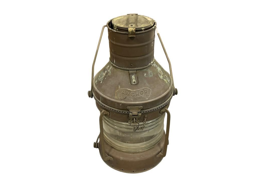 LARGE BRASS NAUTICAL / MARITIME SHIPS LANTERN WITH CLEAR GLASS GLOBE: FEATURES RIBBED GLASS GLOBE, SWIVEL HANDLE, ANCHOR EMBOSSED NAME ON TOP HAT' 19" H