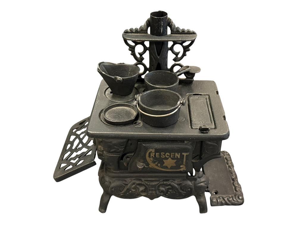 VINTAGE CRESCENT SALESMAN SAMPLE CAST IRON STOVE: INCLUDES MANY ACCESSORIES / PIECES, MISSING A FEW PIECES TO BE COMPLETE 8" H