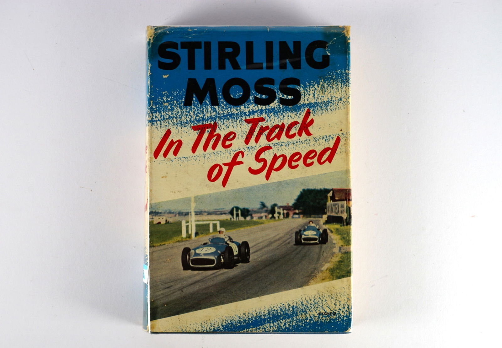MOSS: 'In The Track of Speed' hardcover book by Stirling Moss. Stirling Moss signature (1 of 3)
