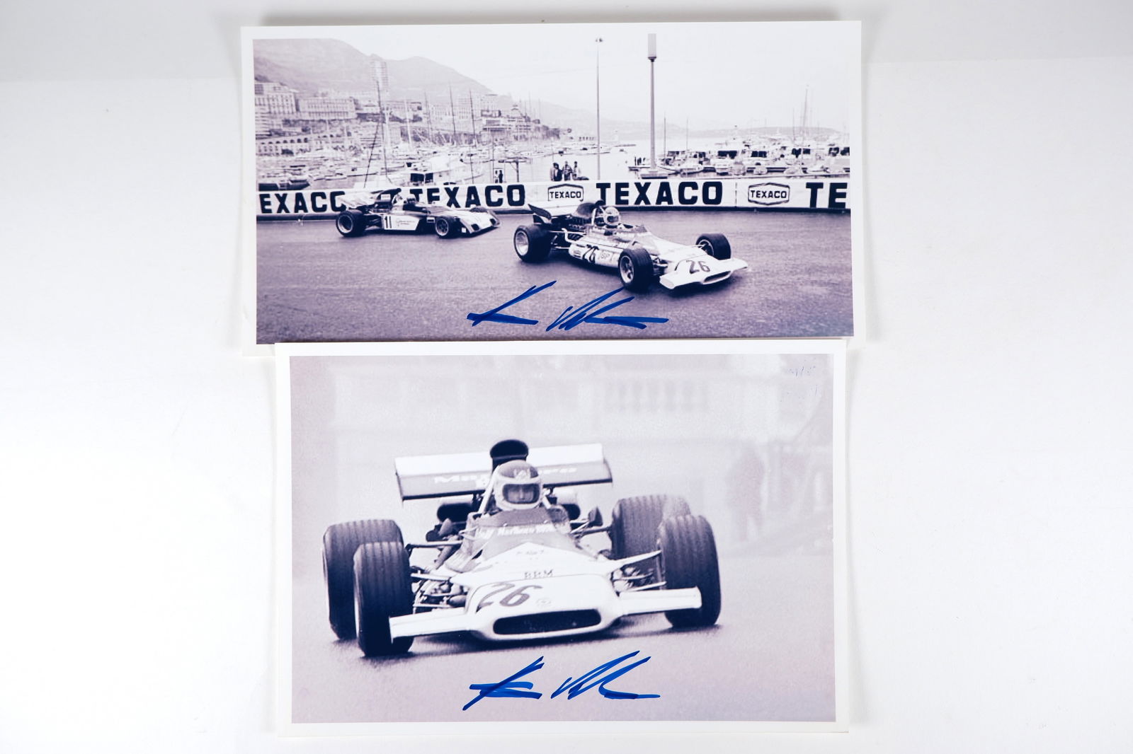 MARKO: Two images featuring Helmut Marko racing the BRM at Monaco, 1972. Helmut Marko signatures: MARKO: Two black and white images featuring Helmut Marko racing the BRM at Monaco, 1972, each image signed by Marko in blue; largest image measures 27.5cm wide, 14.5cm high overall.