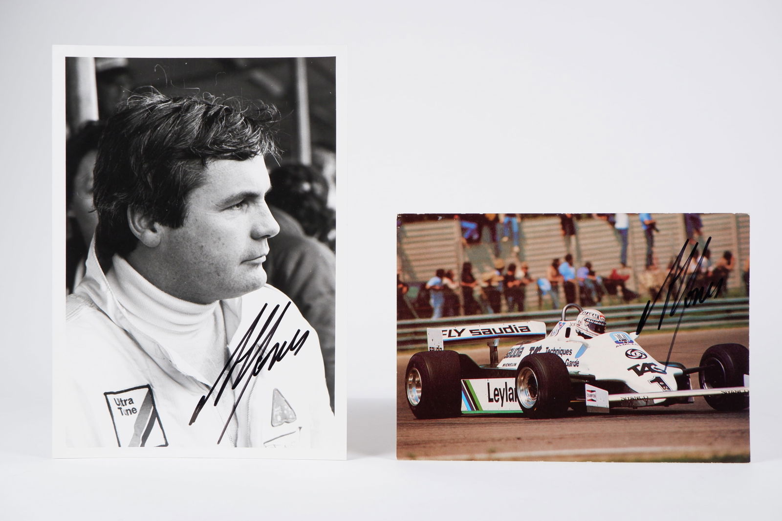 JONES: A.J items. Ian Smith portrait photograph & FW07C-Ford Cosworth Postcard. A.J signatures: JONES: Two original items associated with Alan Jones including a portrait photograph of Alan Jones by Ian Smith and Associates, with postcard depicting an image of Jones driving a FW07C-Ford Cosworth