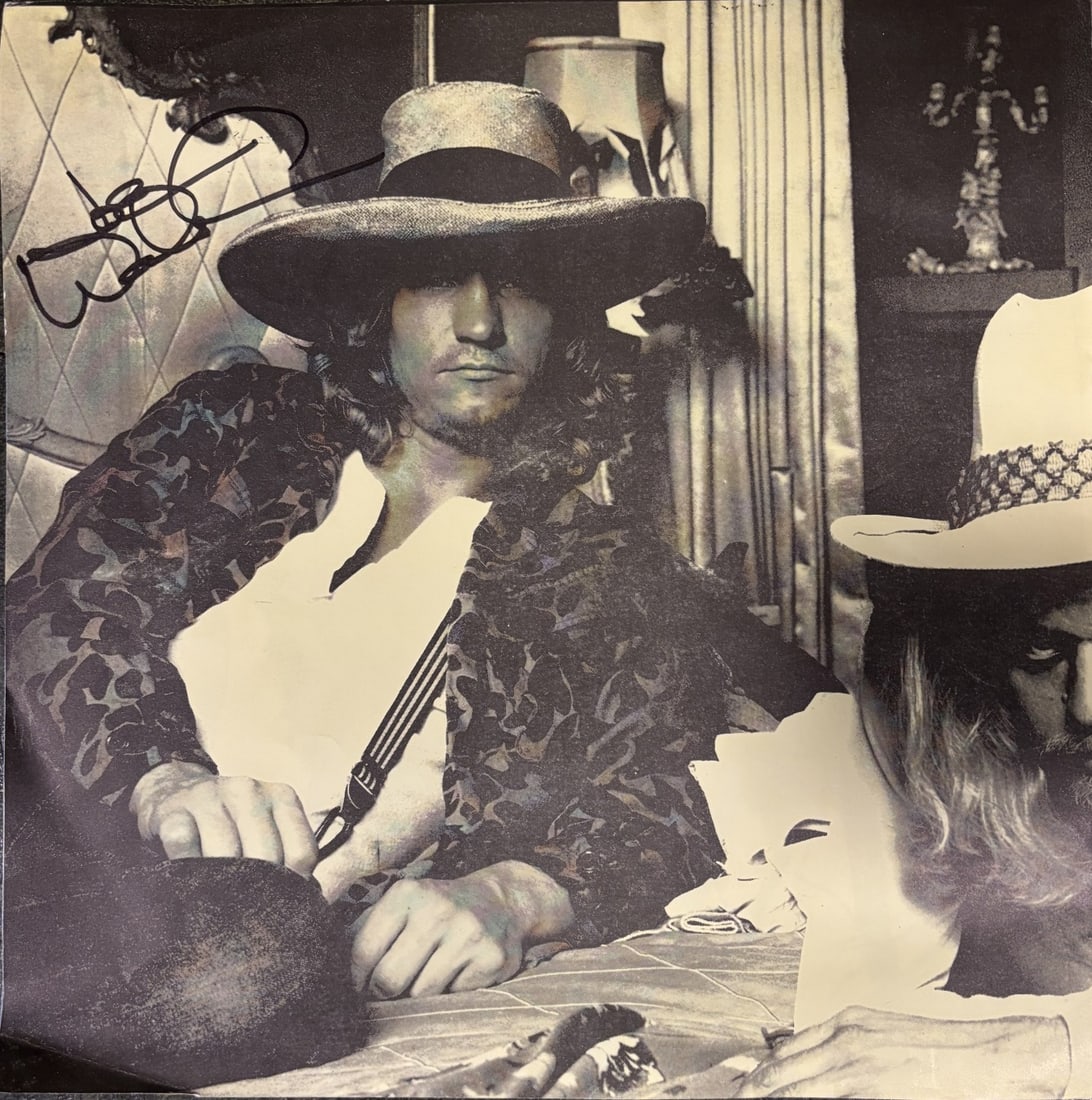 EAGLES: A poster for the Eagles' Hotel California album, signed by Joe Walsh & by Randy Meisner (1 of 3)