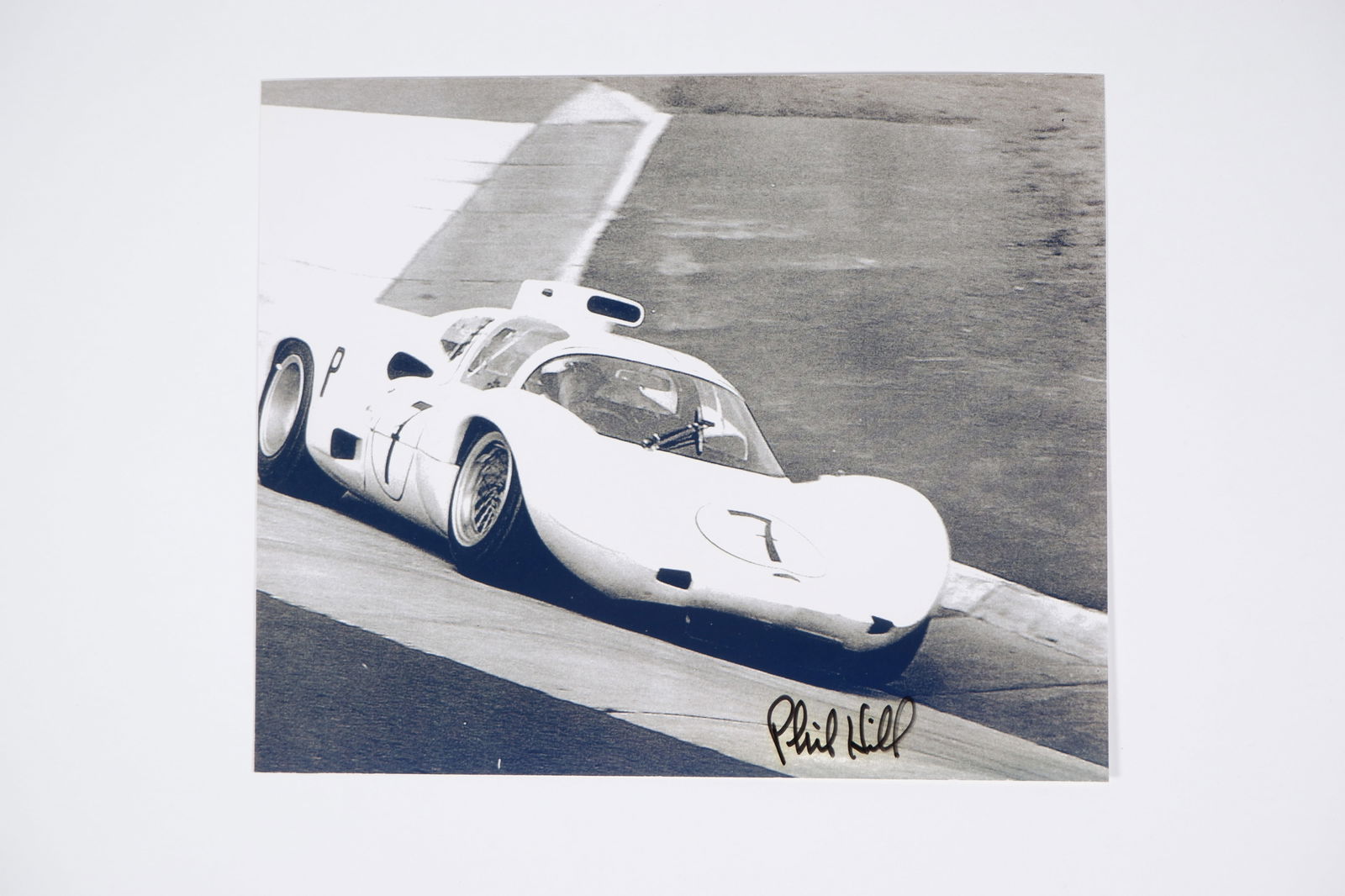 HILL: A black and white image of Phil Hill racing a Chaparral 2F. Hill signature (1 of 1)