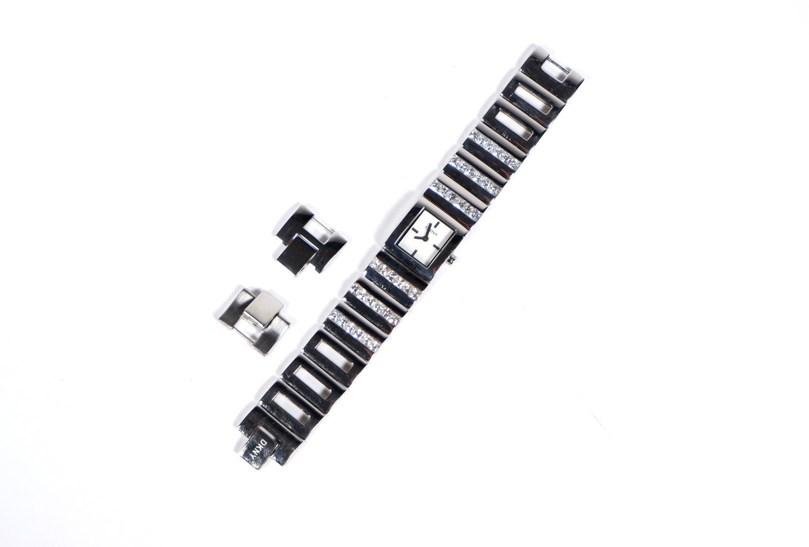 A DKNY ladies watch: in original retail box. Not recently serviced or timed. Condition Some scratching to the chrome finish. Item sold as is. Please note: These pieces are antique, vintage, or pre-loved, and may show sign