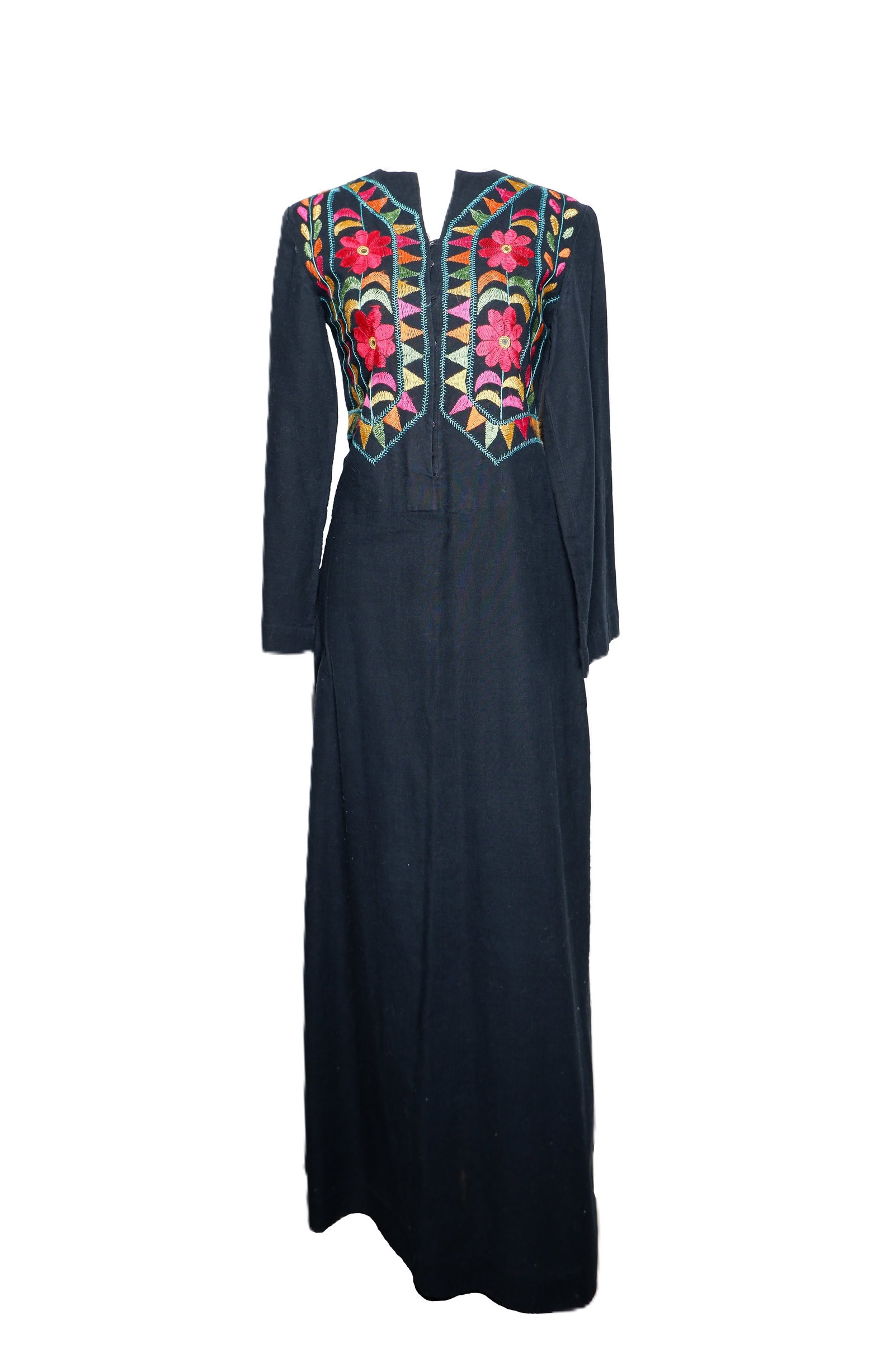 An embroidered black cotton tunic dress, Indian, 1970's: with mirror adornments. size 8. Condition Some unthreading to the embroidery throughout. Fair condition. Please note: These pieces are antique, vintage, or pre-loved, and may show signs of age or wear