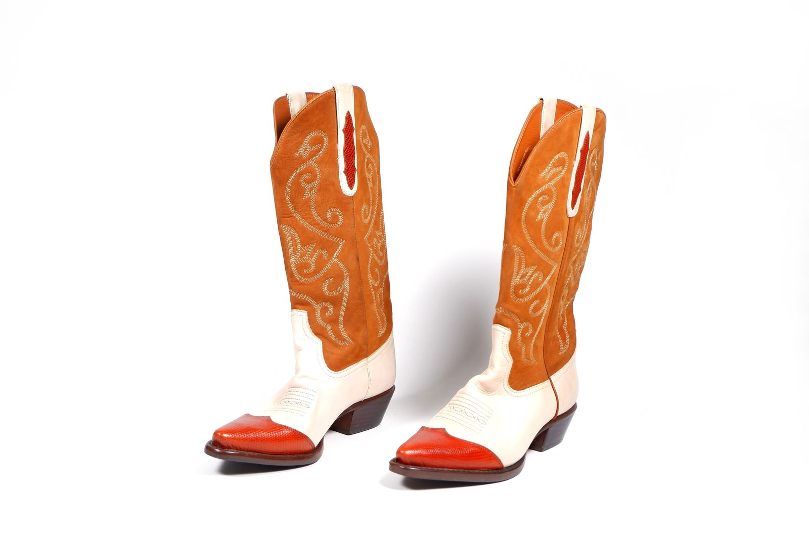 A pair of vintage style tan and stone coloured leather cowboy boots: size 8. Condition Very good condition. Please note: These pieces are antique, vintage, or pre-loved, and may show signs of age or wear such as fading, minor imperfections, or delicate areas. While our