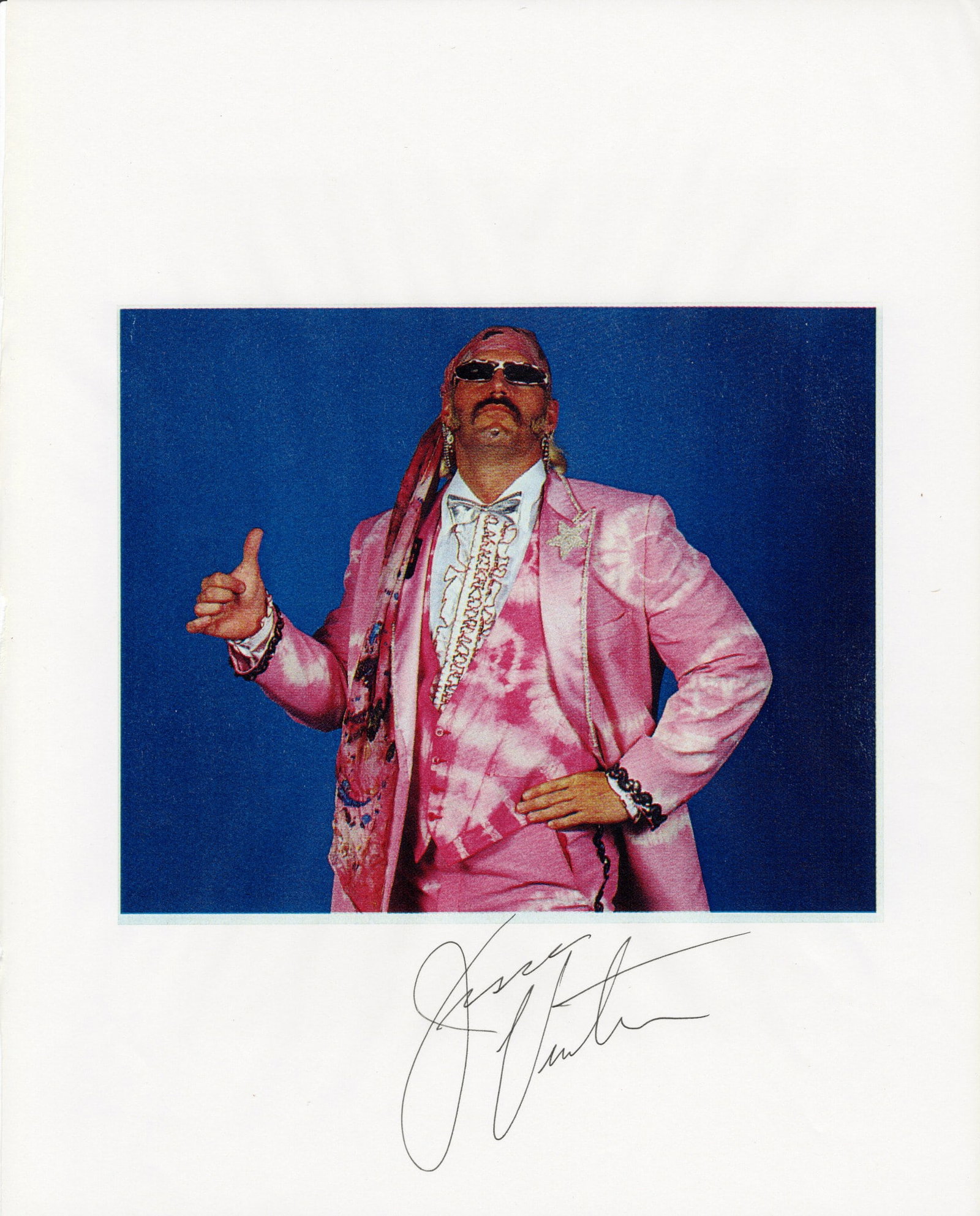 JESSE VENTURA: A framed image of Jesse "The Body" Ventura signed to front by Jesse Ventura: JESSE VENTURA: A framed image of Jesse "The Body" Ventura, signed to front in black pen by Jesse Ventura, framed image measures 21.5 x 26.5cm overall