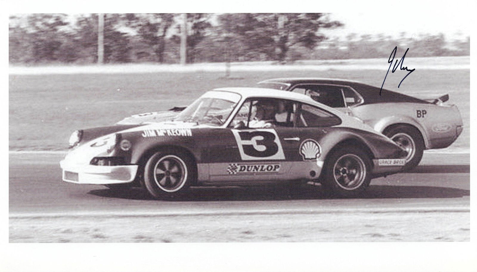 McKEOWN: A black and white image of the Jim McKeown Porsche Carrera 911 S. Image signed by McKeown: McKEOWN: A black and white image of the Jim McKeown Porsche Carrera 911 S, image signed by McKeown; on photographic paper, image measures 21cm wide,14cm high overall.